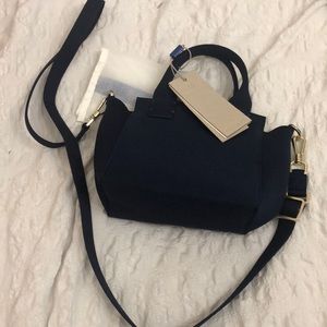 Navy Rothy’s Mini handbag